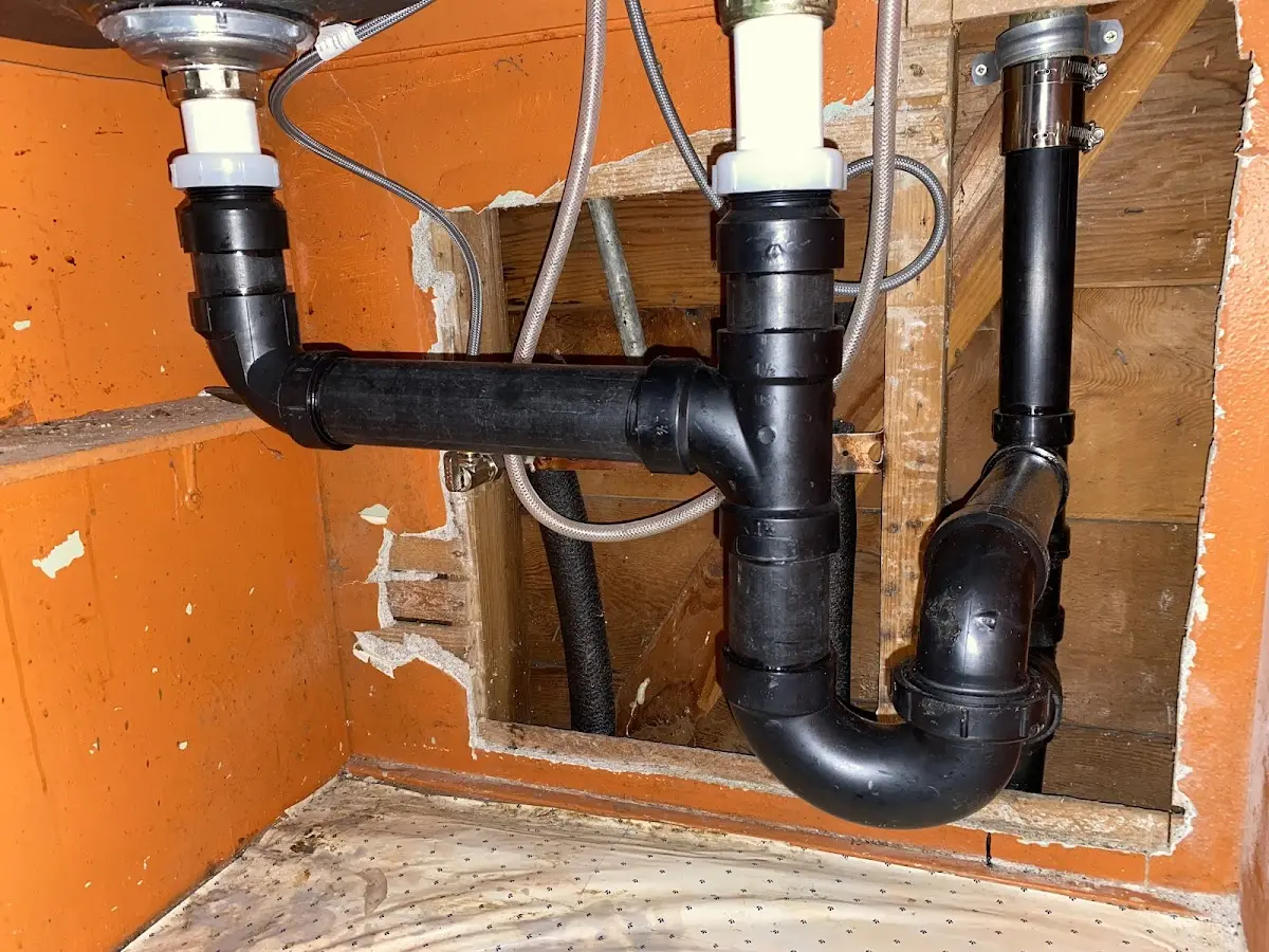 Professional Garbage Disposal Repair equipment and tools on the job in Anderson